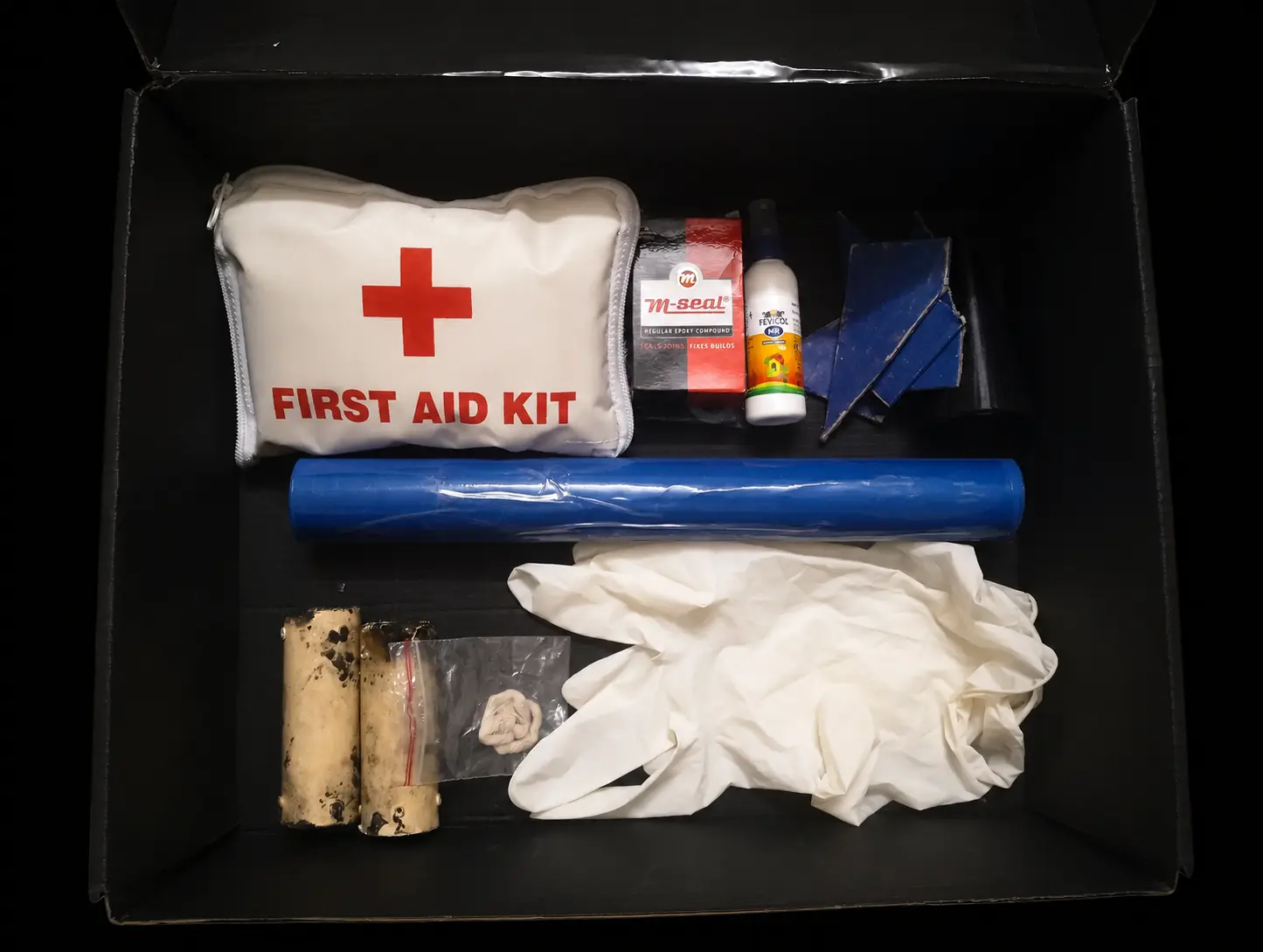 TEL kit contents arranged in presentation boxes